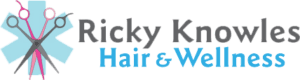 A black background with the words lucky kitty hair & wig shop in blue.